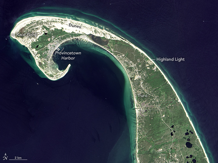 On the southeastern elbow of Cape Cod, where the New England coast reaches out into the cold and choppy North Atlantic, this natural progression has been taking place in full view of satellites for more than 30 years. The images above were acquired by the Operational Land Imager on Landsat 8 (top) and the Thematic Mapper on Landsat 5 (bottom). They show the shape of the coast off of Chatham, Massachusetts, on June 12, 1984, and July 30, 2013. Turn on the image comparison tool for an easier view of the changes. Visit our longer World of Change time series to see the years in between.