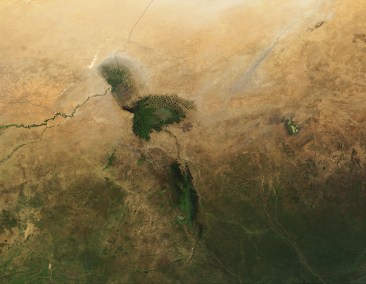 Lake Chad was once one of the African continent's largest bodies of fresh water, close in surface area to North America's Lake Erie. But today it is a ghost of its former self, reduced to only about 1/20 th its former size in just four decades, thanks to prolonged drought and human demand for water. Found at the intersection of four different countries in West Africa (Chad, Niger, Nigeria, and Cameroon), Lake Chad has been the source of water for massive irrigation projects. 

True-color image taken by NASA's Moderate Resolution Imaging Spectroradiometer (MODIS) on October 21, 2001.
Credit: Jacques Descloitres, MODIS Land Rapid Response Team, NASA/GSFC.