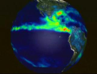 A rotating globe showing the monthly average rainmap for September 1998 as measured by TRMM.  High rainfall rates are in red.