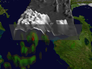 Scan across the clouds of Tropical Depression 14 to reveal the rain structure.  Blue represents areas where at least 0.5 inches of rain fell per hour.  Green shows at least 1.0 inch of rain. Yellow is 1.7 inches and red depicts more than 2.2 inches of rain per hour. 