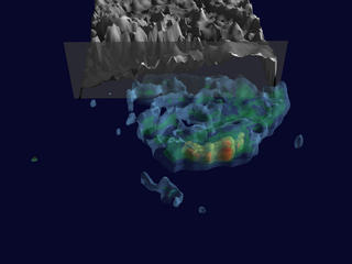 Peel away the clouds to reveal the underlying rain structure.  The rain structure is depicted with 5 different isosurfaces.  The first isosurface is grey and depicts areas with 0.5 inches of rain per hour.  The second is light blue and reflects 1.0 inches of rain per hour.  The third is green and shows 1.7 inches of rain per hour.  The forth is yellow and represents 2.0 inches of rain per hour. The last isosurface is red and shows 2.2 inches or more of rain per hour.