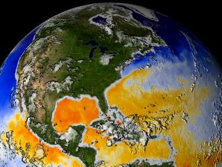 As the hurricanes move through the ocean, they each leave a wake of cold water.  This visualization shows the cold water trails left by Hurricanes Fabian and Isabel.  The red/orange/blue colors represent the ocean temperatures (orange/red is 82 degrees F and higher).