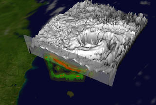 Peel the cloud layer away to see the actual rain structure of Hurricane Isabel on September 17, 2003.