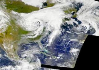 Tropical Storm Allison, as captured by the SeaWiFS instrument.  The images in this animation are each composites of one days worth of data.This product is available through our Web Map Service.