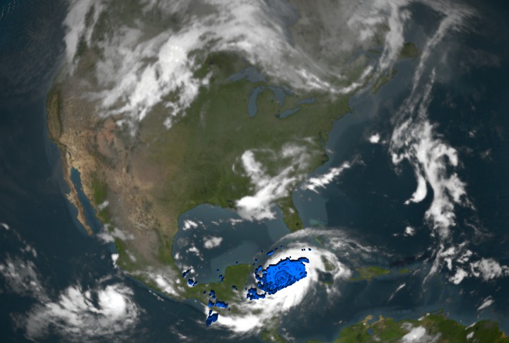 Zooms down to Hurricane Ivan on September 13, 2004.  It looks underneath of the storms clouds to reveal the underlying rain structure.  Blue represents areas with at least 0.25 inches of rain per hour.  Green shows at least 0.5  inches of rain per hour.  Yellow is at least 1.0 inches of rain and Red is at least 2.0 inches of rain per hour.