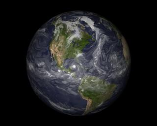 An image illustrating the global nature of the fvGCM model.  The white cloud-like features show the cloud cover and total moisture calculated by the model and help to illustrate wind motion.  The modeled hurricane Ivan is visible in the center of the image.