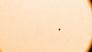 Movie of Mercury passing across the disk of the Sun.