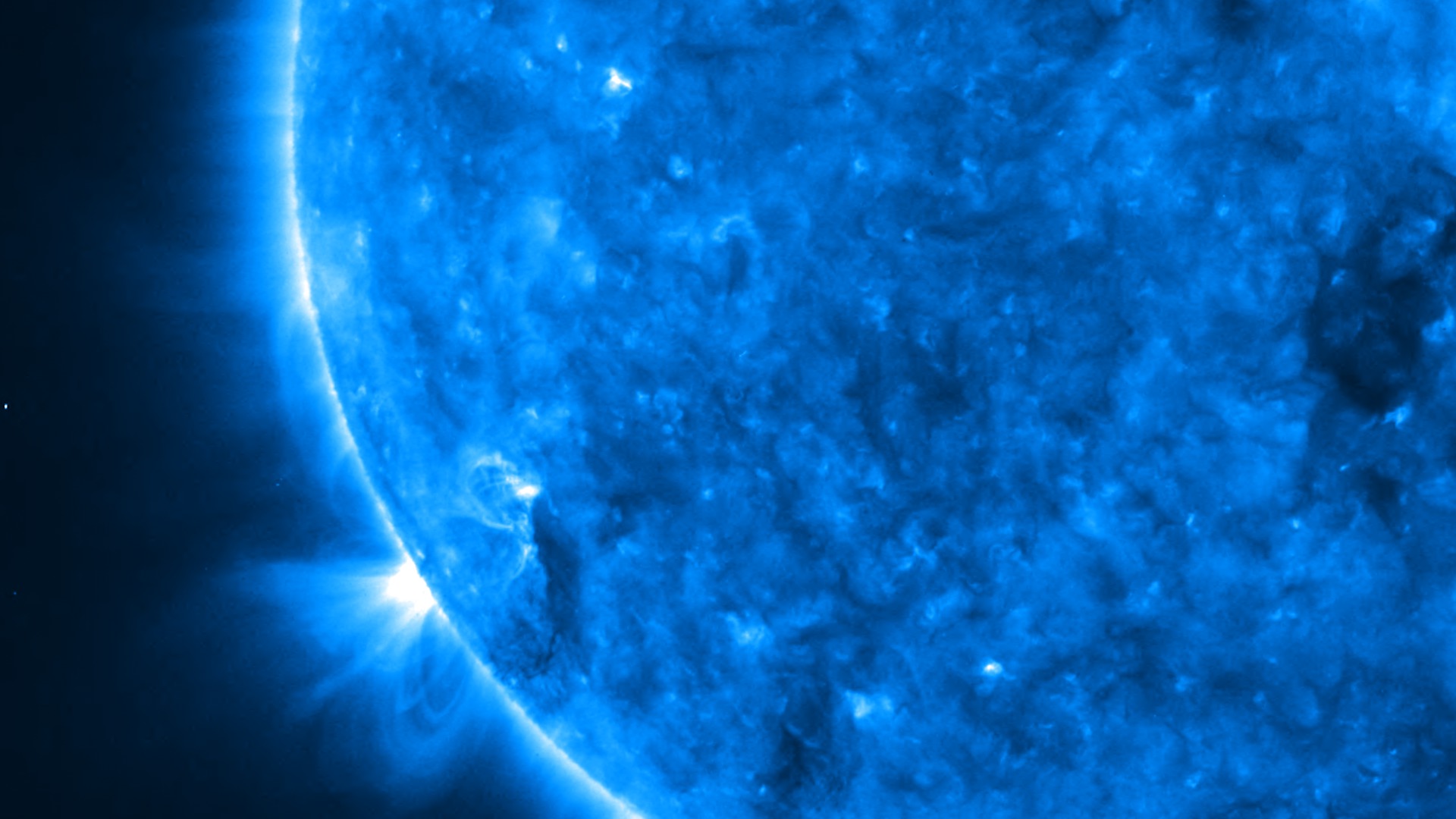 This movie starts at a close-up of the Sun in ultraviolet from STEREO EUVI and pulls out to reveal the broad sky coverage of the Heliospheric Imager (HI) cameras.