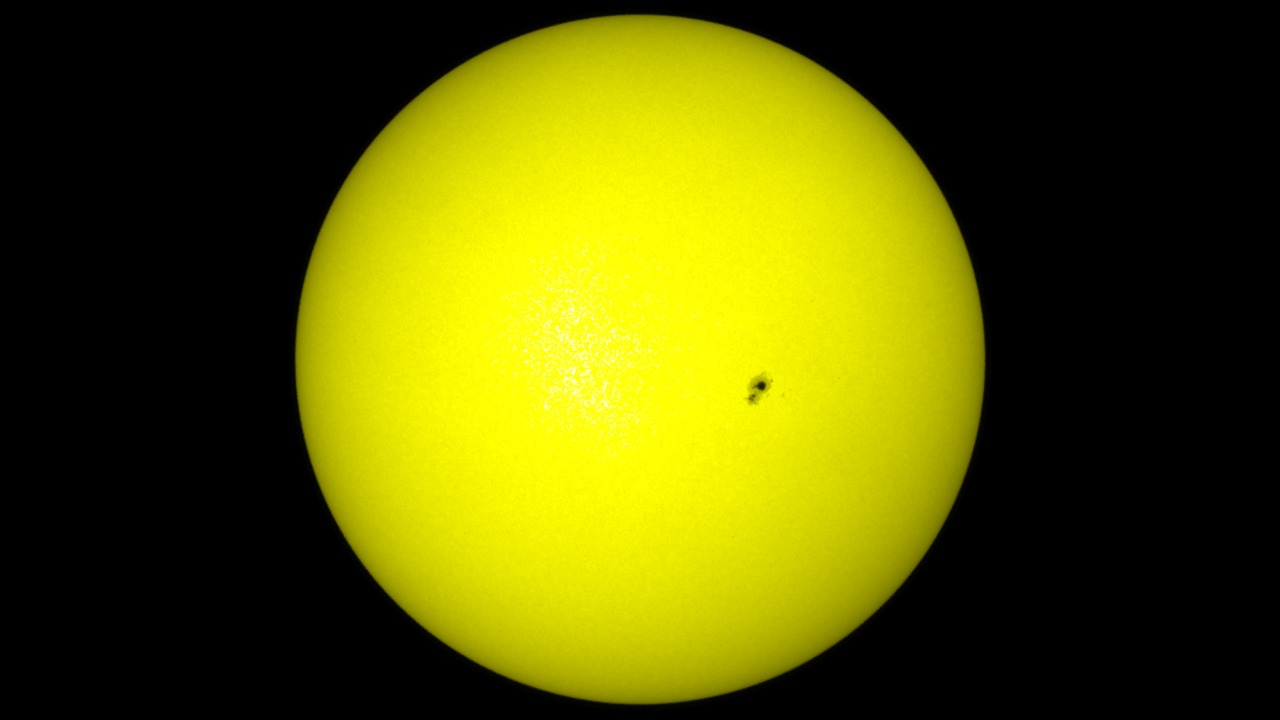 This movie opens with a full solar disk view from SOHO/MDI and zooms into the high-spatial and temporal resolution view from the Hinode SOT G-band filter.