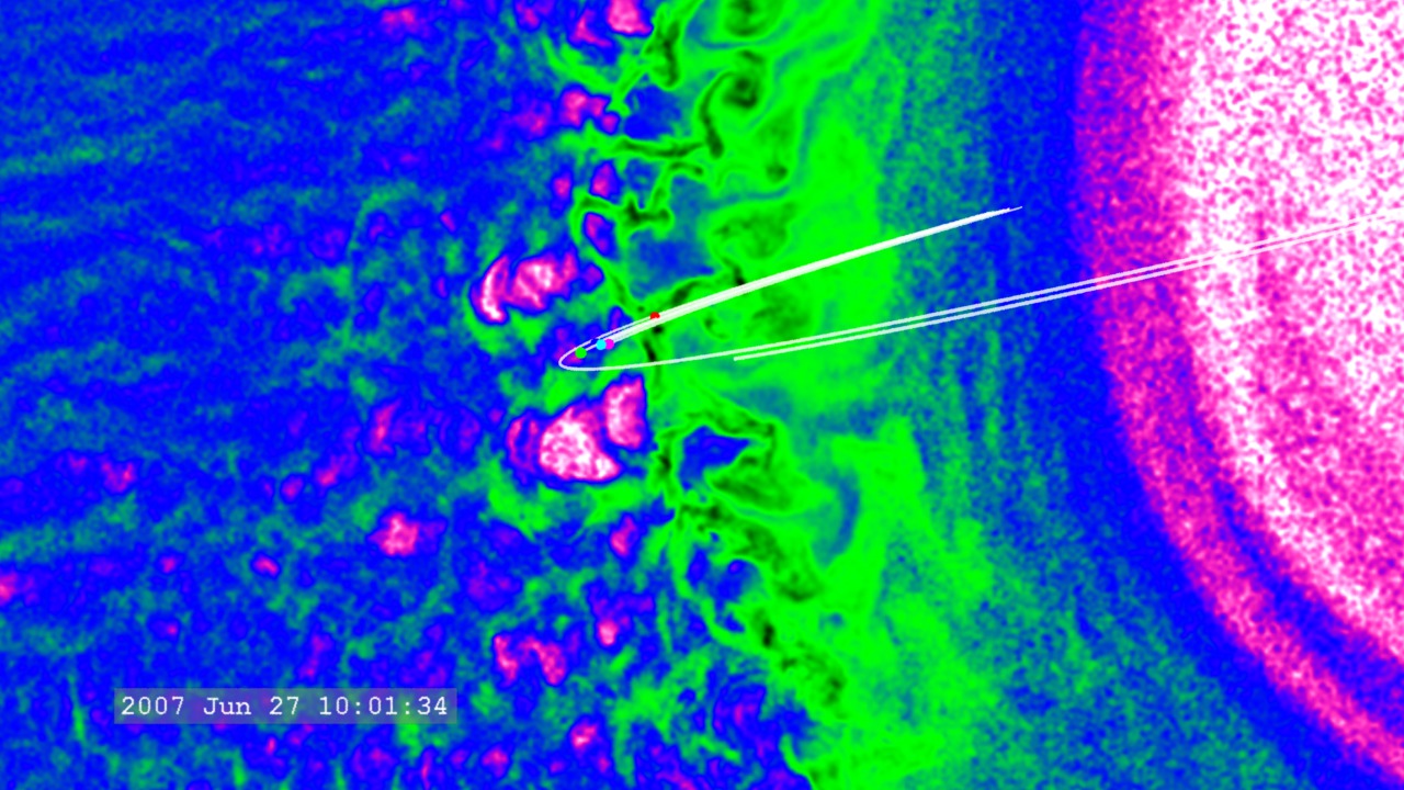 This movie opens with a view of the five THEMIS satellites (the color dots) moving along their orbits.  We then fade in the 2-D data from the Omidi simulation and zoom in to view the turbulence in the region of the bow shock.