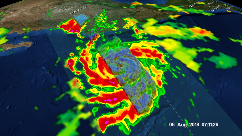 GPM passed over Tropical Storm John on August 6, 2018. As the camera moves in on the storm, DPR's volumetric view of the storm is revealed. A slicing plane moves across the volume to display precipitation rates throughout the storm. Shades of green to red represent liquid precipitation extending down to the ground. Frozen precipitation is displayed in cyan and purple. This video is also available on our YouTube channel.