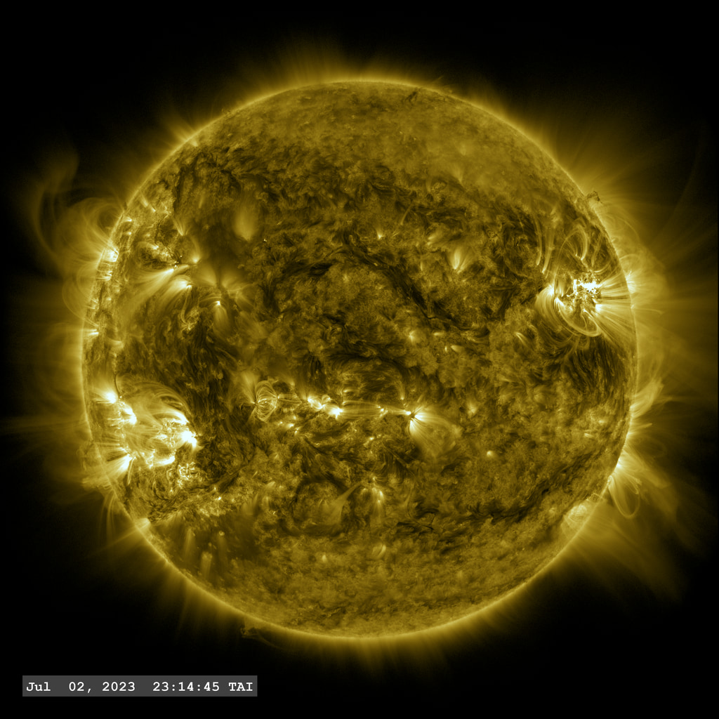 Active Region AR13354 launches an X 1.0 flare just before rotating over the upper right limb of the Sun in this view from the SDO/AIA 171A filter. The point-spread function correction (PSF) has been applied to all this imagery.