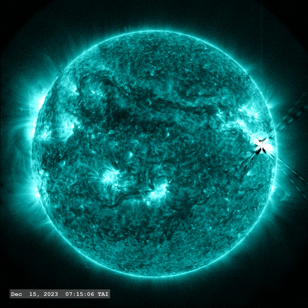 The M6.3 and M6.9 'double flare' erupts from Active Region 13514 near the right limb of the image in this view from SDO/AIA 131 angstrom filter. The point-spread function correction (PSF) has been applied to all this imagery.