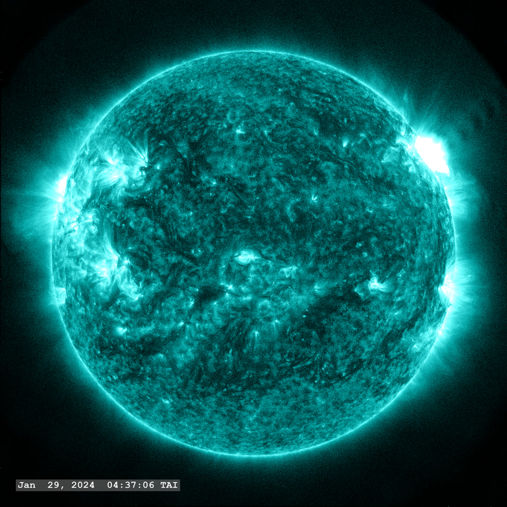 The M 6.8 flare erupts from Active Region 13559 near the right limb of the image in this view from SDO/AIA 131 angstrom filter.   The point-spread function correction (PSF) has been applied to all this imagery. 