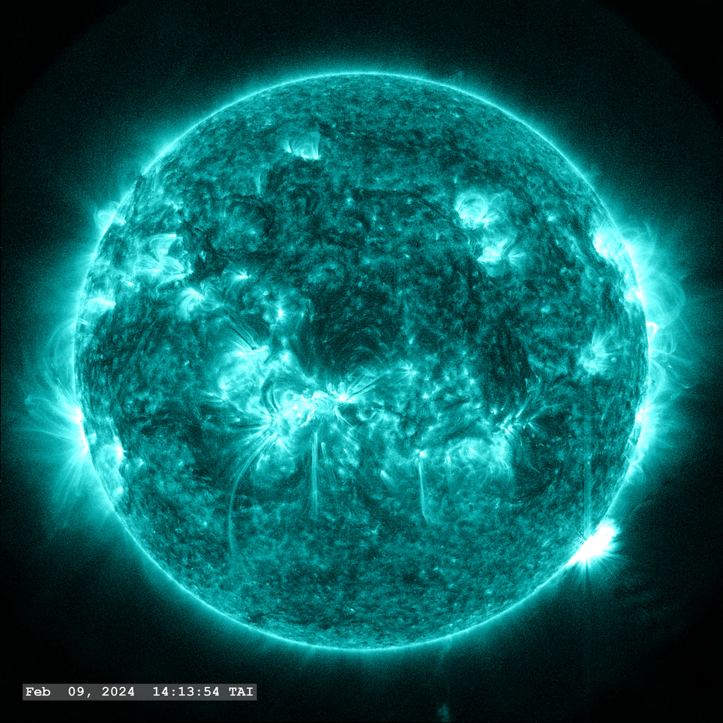 Active Region 13575 errupts again just over the lower right limb of the solar disk, this time with a powerful X3.3 class solar flare in this view from the SDO/AIA 131 angstrom filter.