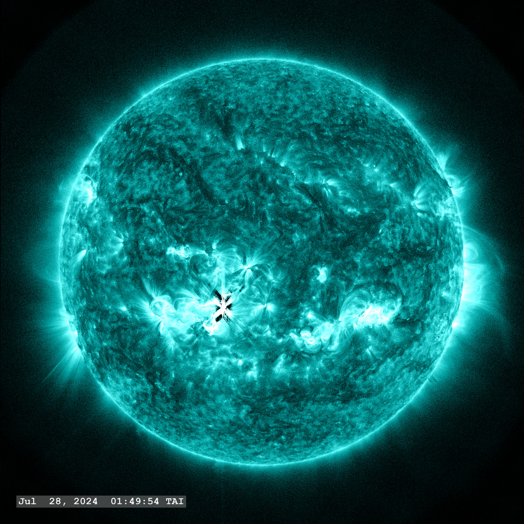 Active Region 13766 (in the lower left quadrant) launches double M-flares in this view through the SDO AIA 131 ångstrom filter.