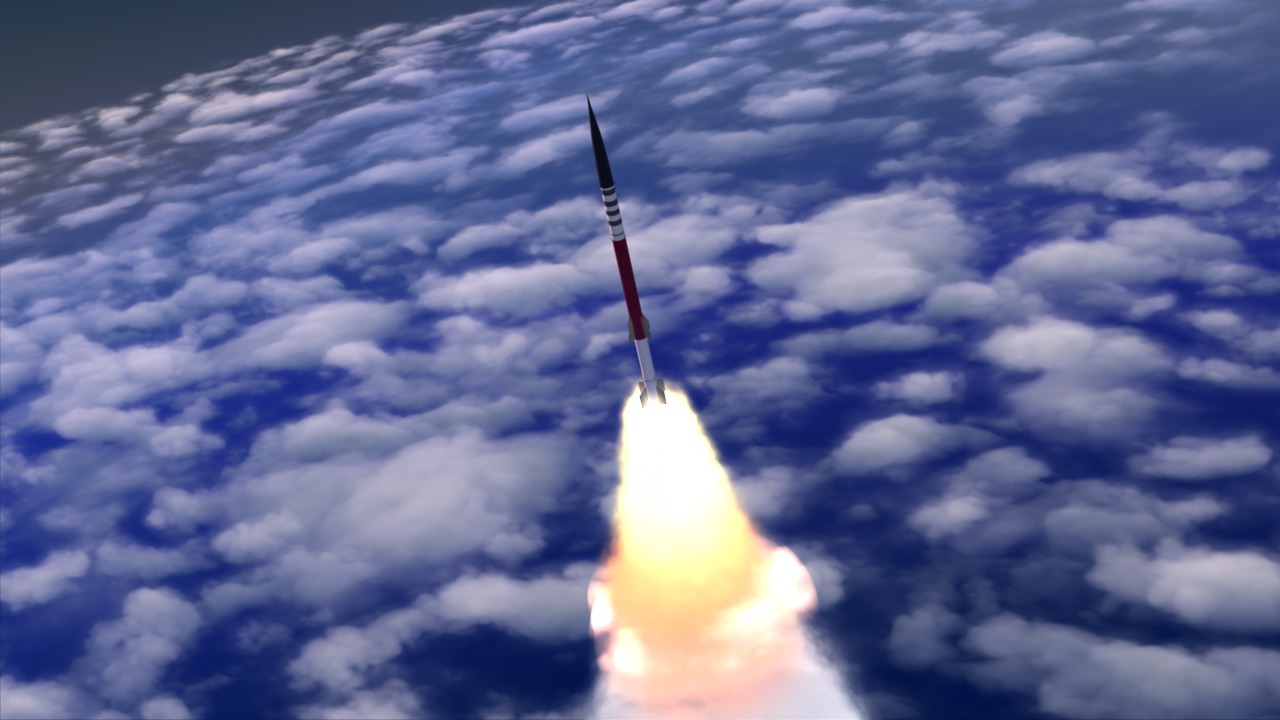 Rocket ascending into space passes by the camera.