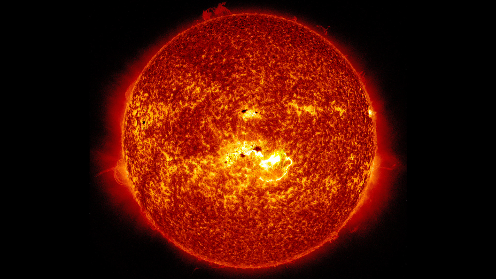 LEAD: What is a X-class solar flare? It is one of the most intense categories of massive bursts of light from the sun.

1. This flare erupted on Tuesday, January 7, 2014.

2. For scale, the dark-colored sun spot is huge...about twice the size of Earth.

3. NASA’s  SDO (Solar Dynamics Observatory) spacecraft, launched in 2010, studies the sun’s magnetic fields.

4. Flares are related to the reconnection, or short-circuiting, of magnetic loops
TAG: Though not a threat to humans, SOME solar flares can disrupt GPS and communication signals.
