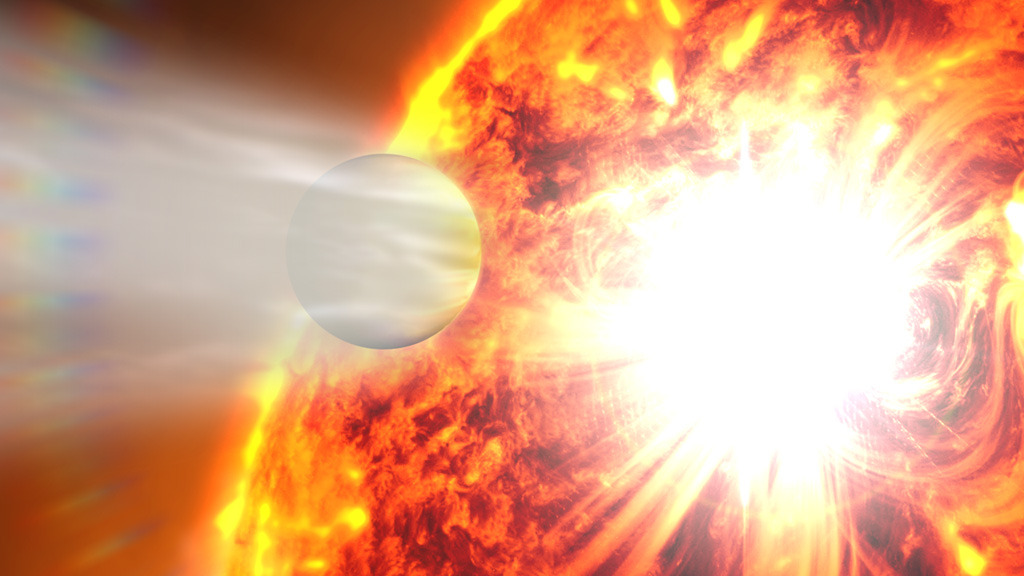 A planet’s atmosphere is blasted away by a stellar flare.