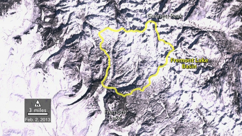 Images from NASA/USGS Landsat satellites show the snowcover in Wyoming's Fremont Lake Basin throughout 2013.  NASA scientists have used Landsat data from 1972-2013 to determine that the snow is melting 16 days earlier.