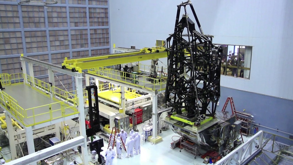 Produced video of engineers in NASA Goddard Space Flight Center cleanroom lifting the Webb Telescope Structure from its shipping container, attaching it to a fixture and translating the entire stucture vertically in the cleanroom.  