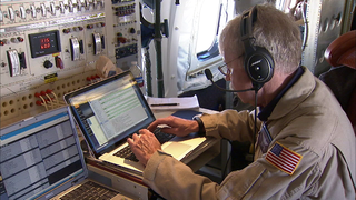 Footage of the research and flight crew on board the DC-8.