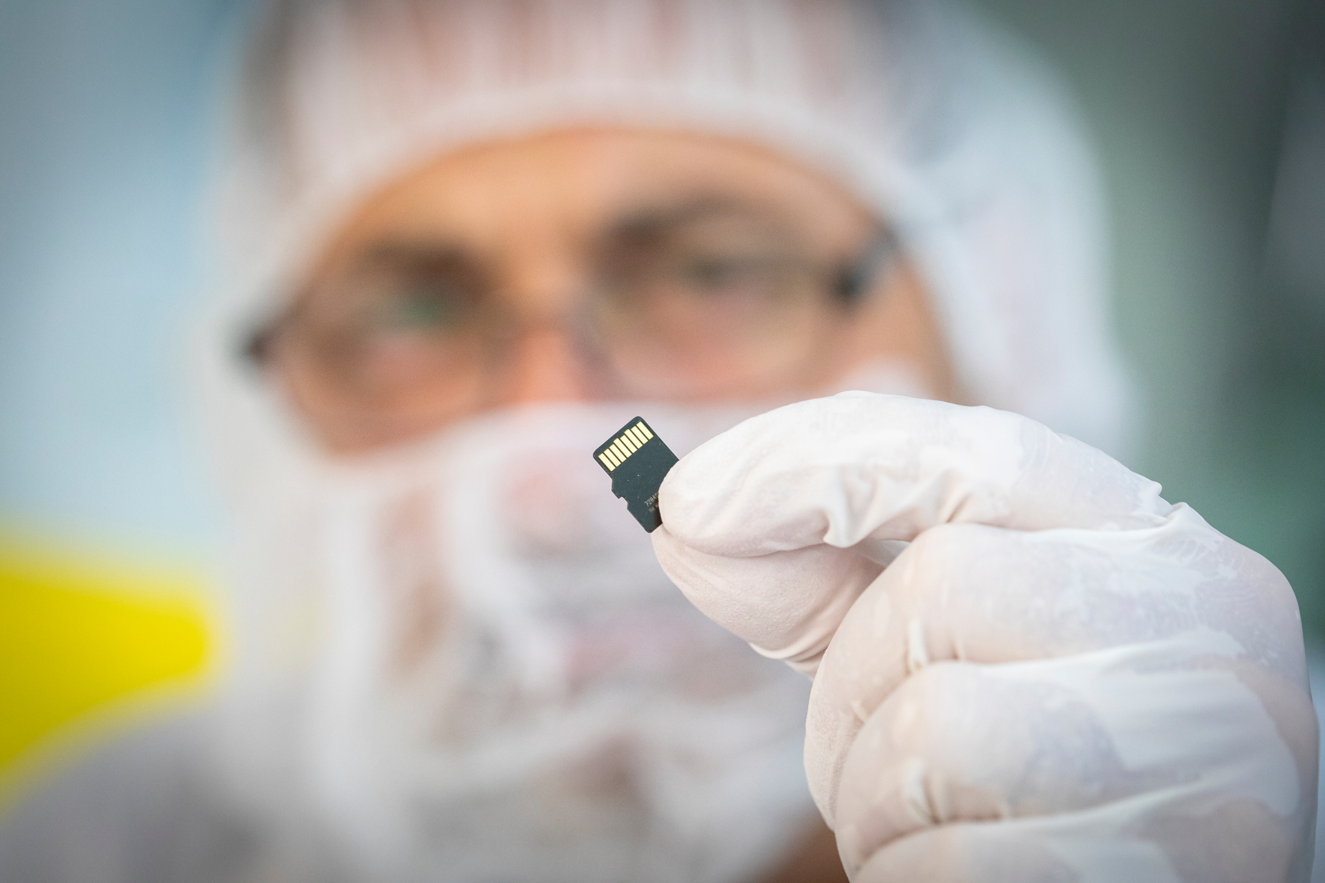 Still imageA Parker Solar Probe team member from the Johns Hopkins Applied Physics Laboratory holds the memory card containing 1,137,202 names submitted by the public to travel to the Sun aboard the spacecraft. The card was installed on a plaque which was placed on the spacecraft on May 18, 2018, at Astrotech Space Operations in Titusville, Florida. The plaque dedicated the mission to Eugene Parker, who first theorized the existence of the solar wind. Parker Solar Probe is the first NASA mission to be named for a living person.Credit: NASA/Johns Hopkins APL/Ed Whitman