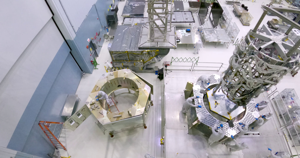 Timelapse of the wire harness as it is lifted on its custom transport basket from the mock primary structure to the flight structure. 