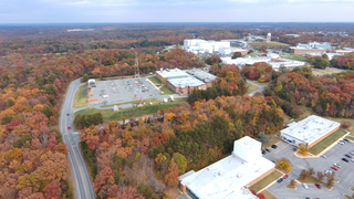 A variety of clips showing flights from the wooded area in the northwest of the Goddard campus favoring Buildings 20 and 28, looking east. Some shots ascend from below the tree tops to reveal the center; others descend below the tree tops. Captured Nov. 9, 2023.Credit: NASA/Francis Reddy