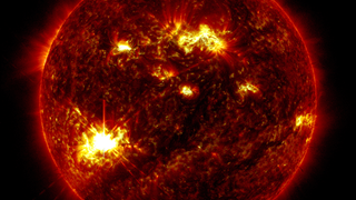 NASA’s Solar Dynamics Observatory captured this image of a solar flare – as seen in the bright eruption on the lower left – at 22:03 UTC on May 31, 2024. The image shows a blend of 131 Angstrom and 304 Angstrom light, subsets of extreme ultraviolet light. Credit: NASA/SDO