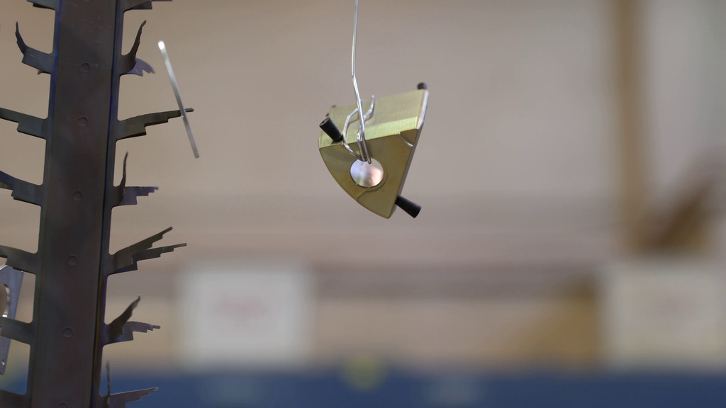 This video shows engineering technician Katrina Harvey anodizing NICER’s patches at the Plating Laboratory at NASA’s Goddard Space Flight Center in Greenbelt, Maryland.0:00 One of the NICER patch bodies hangs from a spiky stick by a wire. 0:05 Patch lids attached to a similar stick are seen submerged in a dark blue liquid. 0:07 Harvey lifts the lids and one patch body from a chemical bath and submerges them in a container of deionized water. 0:24 Several lids have been dyed black. 0:29 Harvey submerges the black lids into a chemical bath covered with white plastic balls. 0:42 Harvey lifts undyed patch bodies from a deionized water rinse. 0:47 Harvey lifts patch bodies from a chemical bath covered in white plastic balls and dunks them in deionized water. 1:07 A wider view of Harvey as she works on the patch bodies in the plating lab. 1:24 The patch bodies are shown submerged in a blue liquid. 1:28 A pan across patch bodies submerged in blue liquid. 1:34 Harvey lifts the patch bodies on their individual wires out of a well where nozzles spray them with deionized water. She then dunks them several times in a container of black dye. 1:54 She adds more patch bodies to the black dye. 2:22 She hangs the dyed bodies in a well where nozzles spray them with deionized water. 2:35 Harvey sprays the patches with deionized water. 2:40 Keith Gendreau (NASA), Steve Kenyon (NASA), and Isiah Holt (NASA) cluster together, looking at one of the dyed NICER patch bodies. 2:48 Harvey rinses dyed patch bodies. 2:58 Harvey holds several dyed patch bodies still on their wires. She lifts them and starts walking through the lab. 3:18 Gendreau and Kenyon help remove plugs from holes in the patch bodies. These protected screw threads during the anodizing process. 3:32: Someone dries one of the patch bodies with compressed air. 3:42 The dyed patch bodies rest on a table. 3:58 Close-ups of various features of the lab, like labels, knobs, readouts, buttons, clamps, and wires.Credit:NASA/Sophia Roberts and Scott Wiessinger