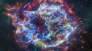 For the first time astronomers have combined data from NASA’s Chandra X-ray Observatory and James Webb Space Telescope to study the well-known supernova remnant Cassiopeia A (Cas A). This work has helped explain an unusual structure in the debris from the destroyed star called the “Green Monster”, first discovered in Webb data in April 2023. The research has also uncovered new details about the explosion that created Cas A about 340 years ago, from Earth’s perspective.A new composite image contains X-rays from Chandra (blue), infrared data from Webb (red, green, blue), and optical data from Hubble (red and white). The outer parts of the image also include infrared data from NASA’s Spitzer Space Telescope (red, green and blue). The outline of the Green Monster can be seen by mousing over the image in the original feature, located here: chandra.cfa.harvard.edu/photo/2024/casa/.The Chandra data reveals hot gas, mostly from supernova debris from the destroyed star, including elements like silicon and iron. In the outer parts of Cas A the expanding blast wave is striking surrounding gas that was ejected by the star before the explosion. The X-rays are produced by energetic electrons spiraling around magnetic field lines in the blast wave. These electrons light up as thin arcs in the outer regions of Cas A, and in parts of the interior. Webb highlights infrared emission from dust that is warmed up because it is embedded in the hot gas seen by Chandra, and from much cooler supernova debris. The Hubble data shows stars in the field.Detailed analysis by the researchers found that filaments in the outer part of Cas A, from the blast wave, closely matched the X-ray properties of the Green Monster, including less iron and silicon than in the supernova debris. This interpretation is apparent from the color Chandra image, which shows that the colors inside the Green Monster’s outline best match with the colors of the blast wave rather than the debris with iron and silicon. The authors conclude that the Green Monster was created by a blast wave from the exploded star slamming into material surrounding it, supporting earlier suggestions from the Webb data alone.The debris from the explosion is seen by Chandra because it is heated to tens of millions of degrees by shock waves, akin to sonic booms from a supersonic plane. Webb can see some material that has not been affected by shock waves, what can be called “pristine” debris.Read more here: chandra.cfa.harvard.edu/photo/2024/casa/.